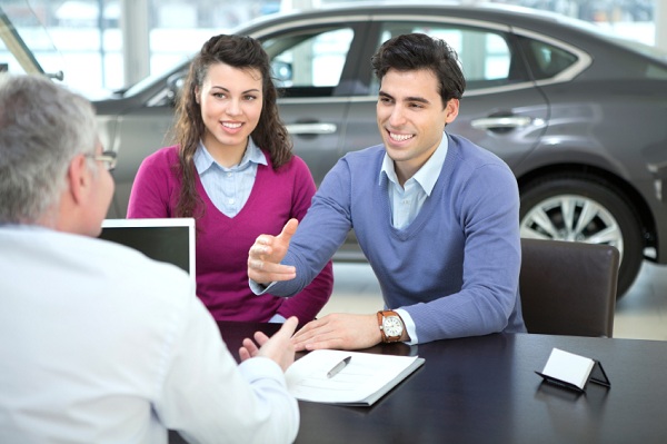 couple buying new car
