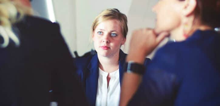 Women Discussing Ideas and Thoughts in Meeting