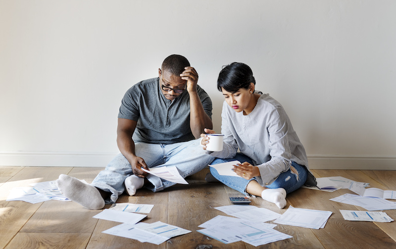 Couple managing debt hero banner