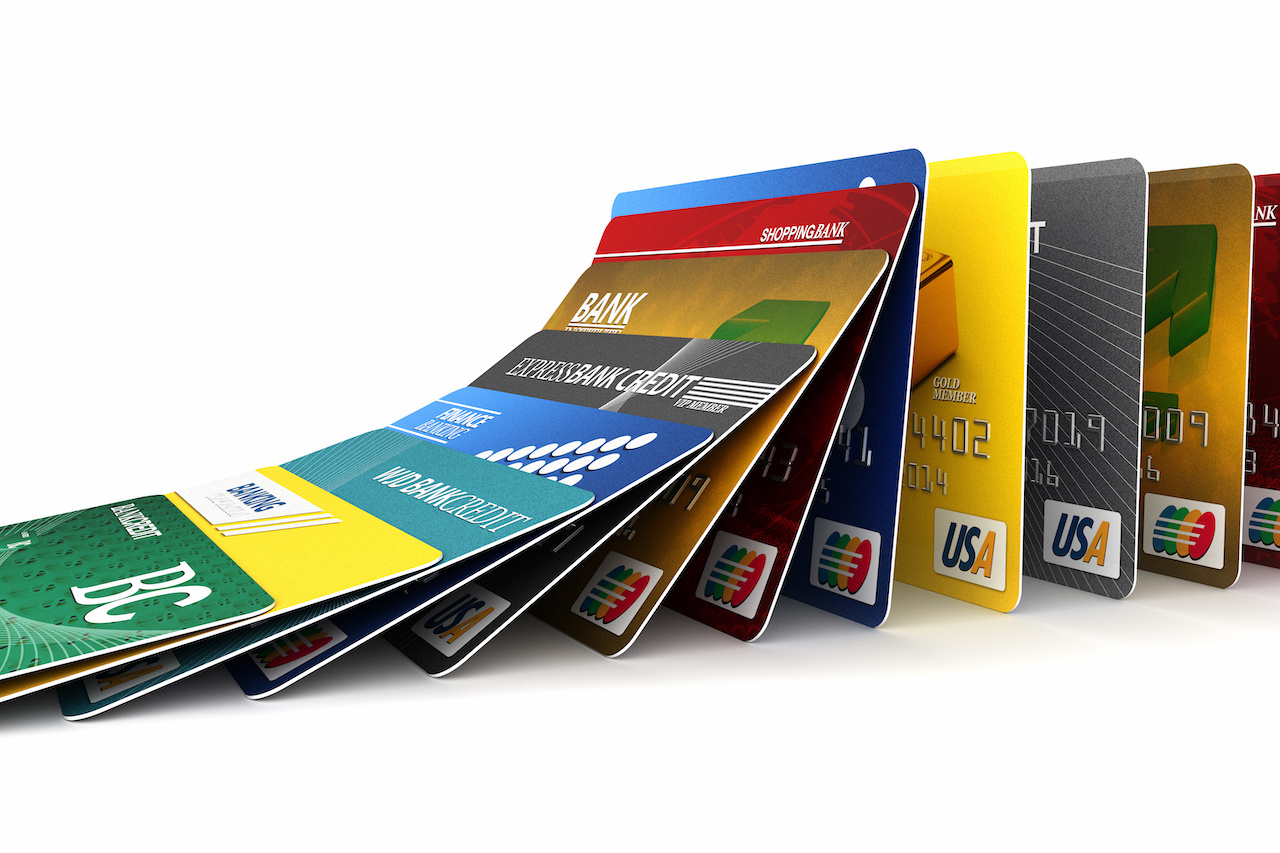 Stacked Credit Cards with Varied Designs and Colors - Representing Financial Options and Payment Methods