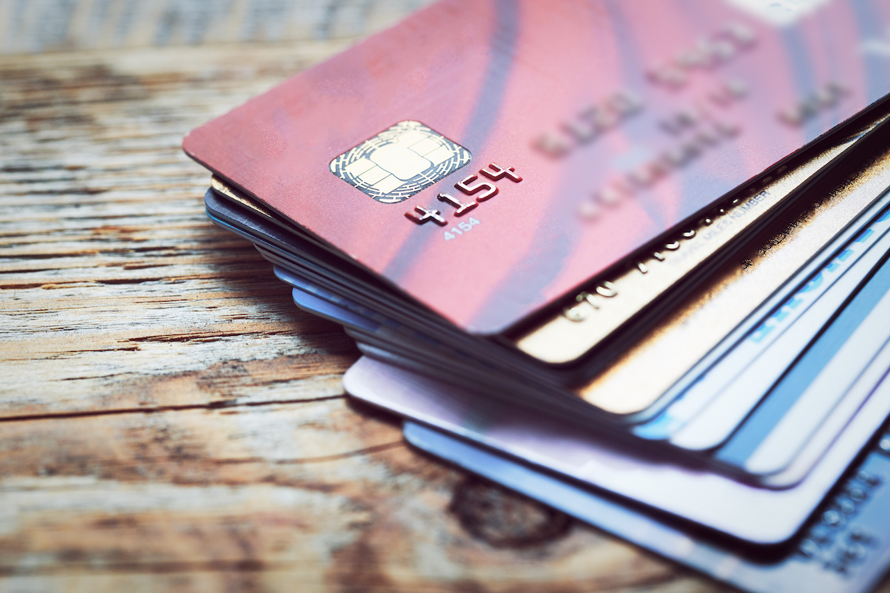 Set of Colorful Credit Cards on Wooden Table