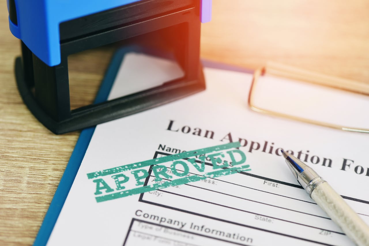 Loan Application Form with Approved Stamp and Pen – Apply for Credit Card or Loan