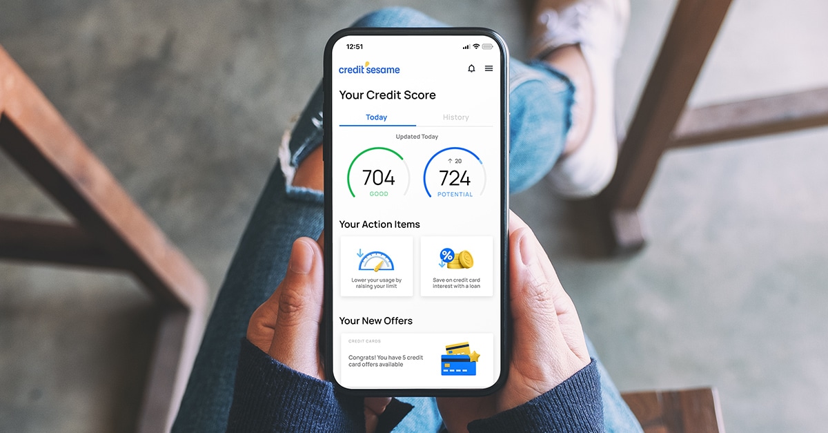 Person Holding Smartphone with Your Credit Score Display