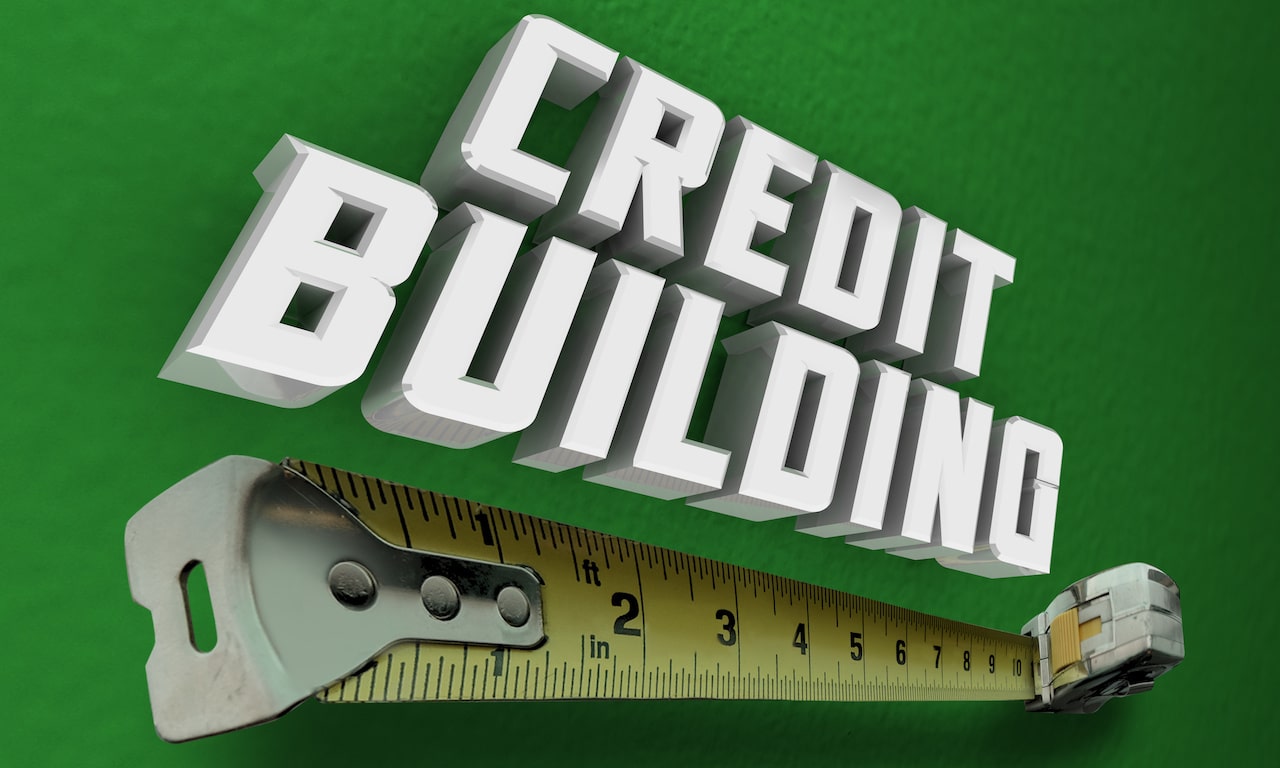 Green background with credit building words